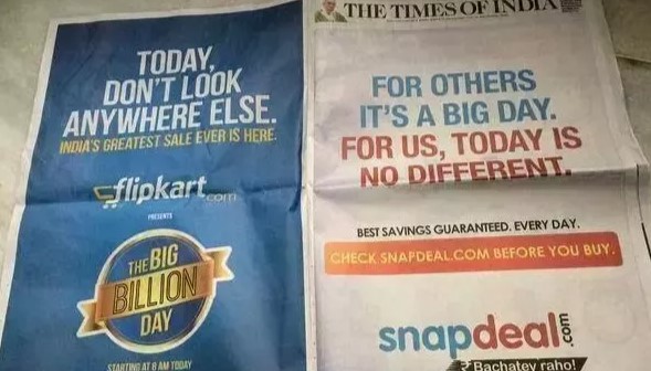 A picture showing offline marketing activities via newspaper ads.