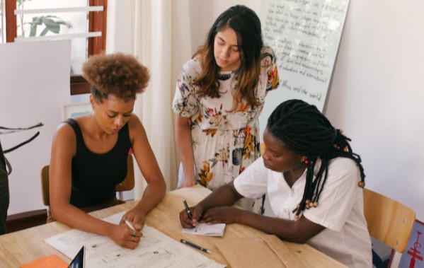 People of an organization discussing marketing strategy