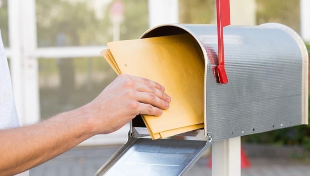 A person direct mailing to reach potential customer
