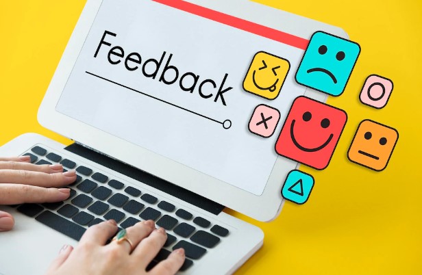 picture showing offline marketing activities via feedback on the screen of a laptop with different moods