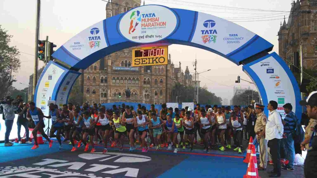 This image shows TATA sponsoring the Mumbai Marathon as a part of its CSR activities