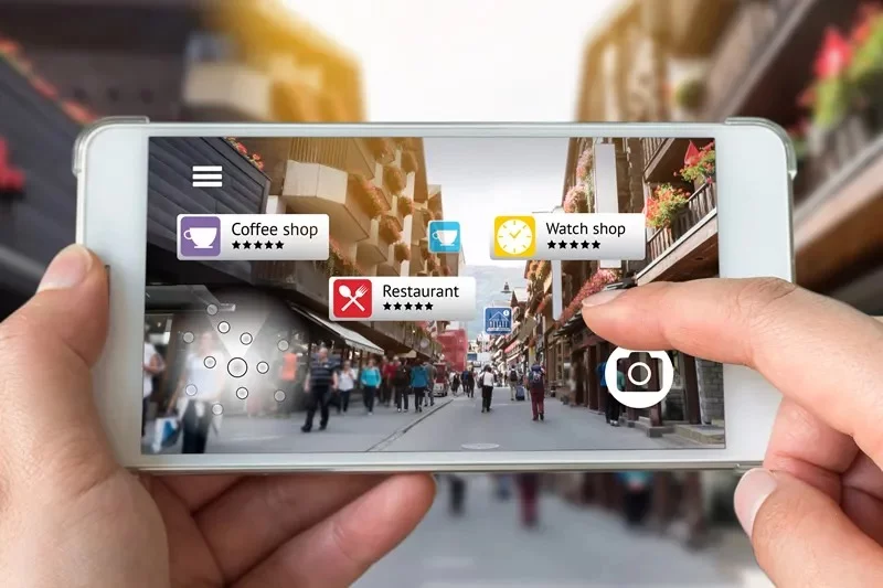 This image shows a street visible from a smartphone with several landmarks as an example of augmented reality