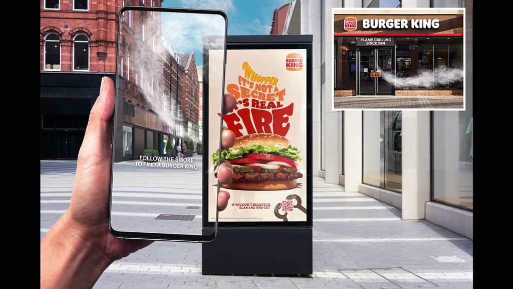 This image shows the application of AR with digital signage of Burger King enhancing brand awareness