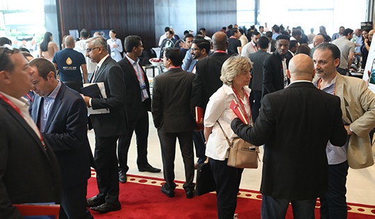 This image shows the role of event sponsorships in offline advertising with people networking with each other