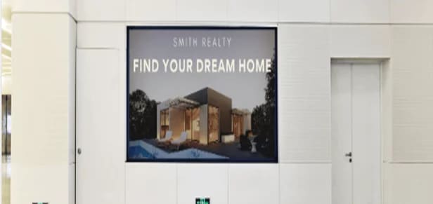 This image shows a tv ad for Smith Realty