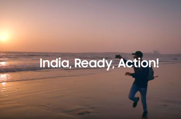 This image shows a boy running on a beach with a Samsung phone capturing a video as a part of the #IndiaReadyAction campaign of Samsung