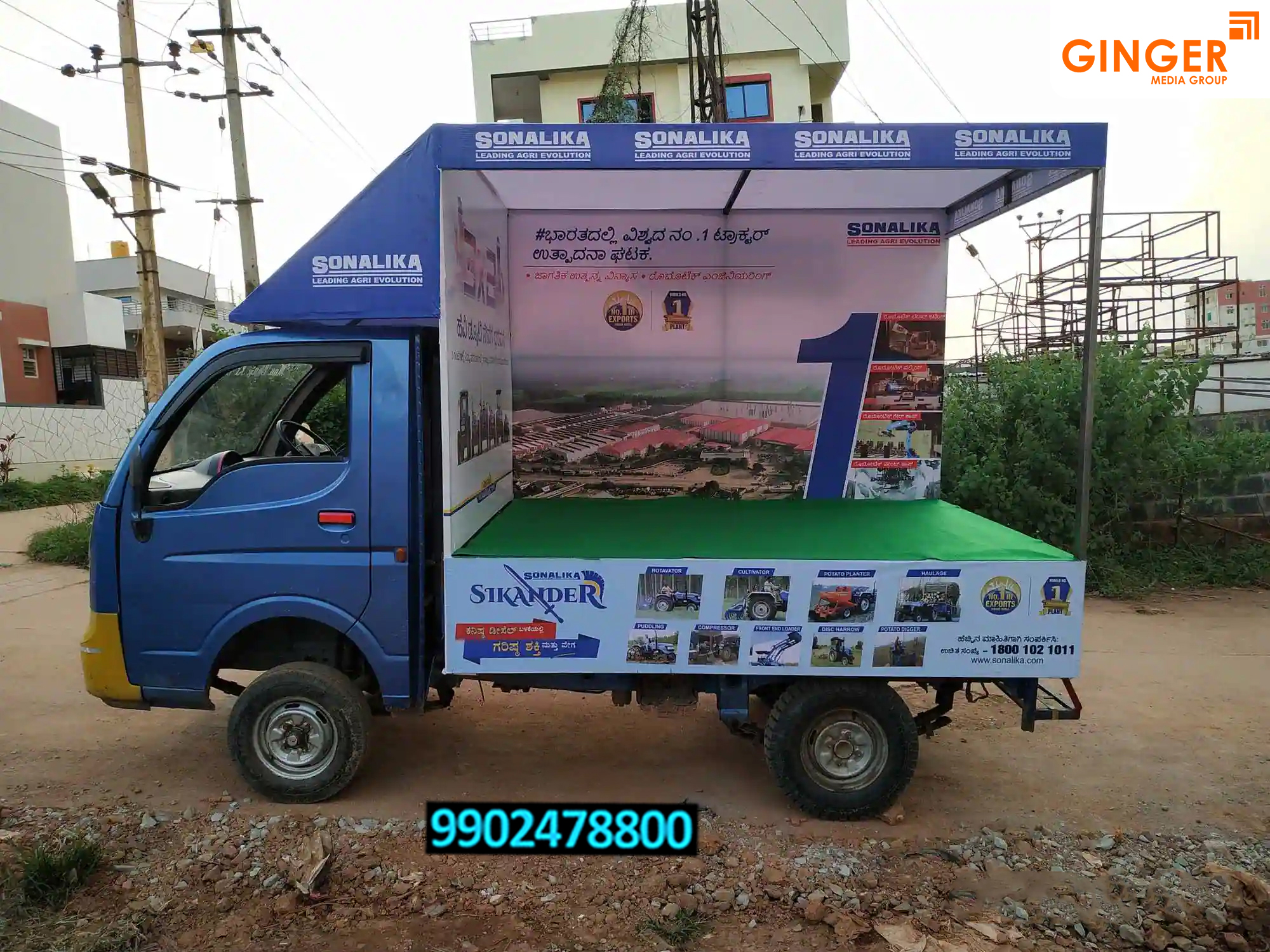 mobile van advertising in India with white and blue color
