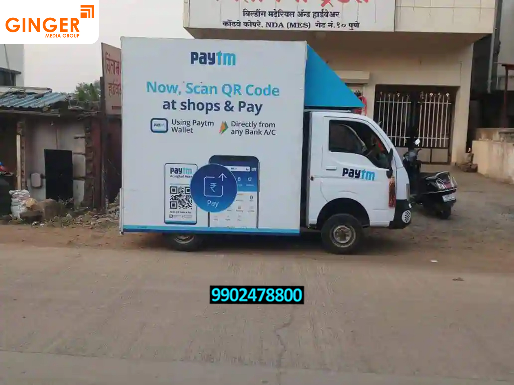 mobile van advertising on road in India for Paytm