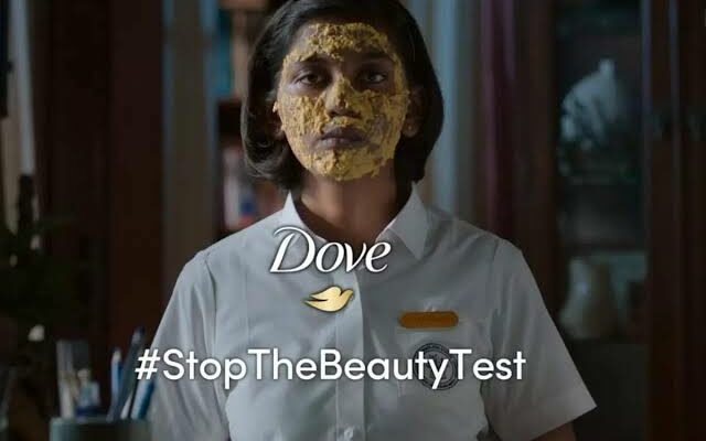 A women with haldi on her face is shown