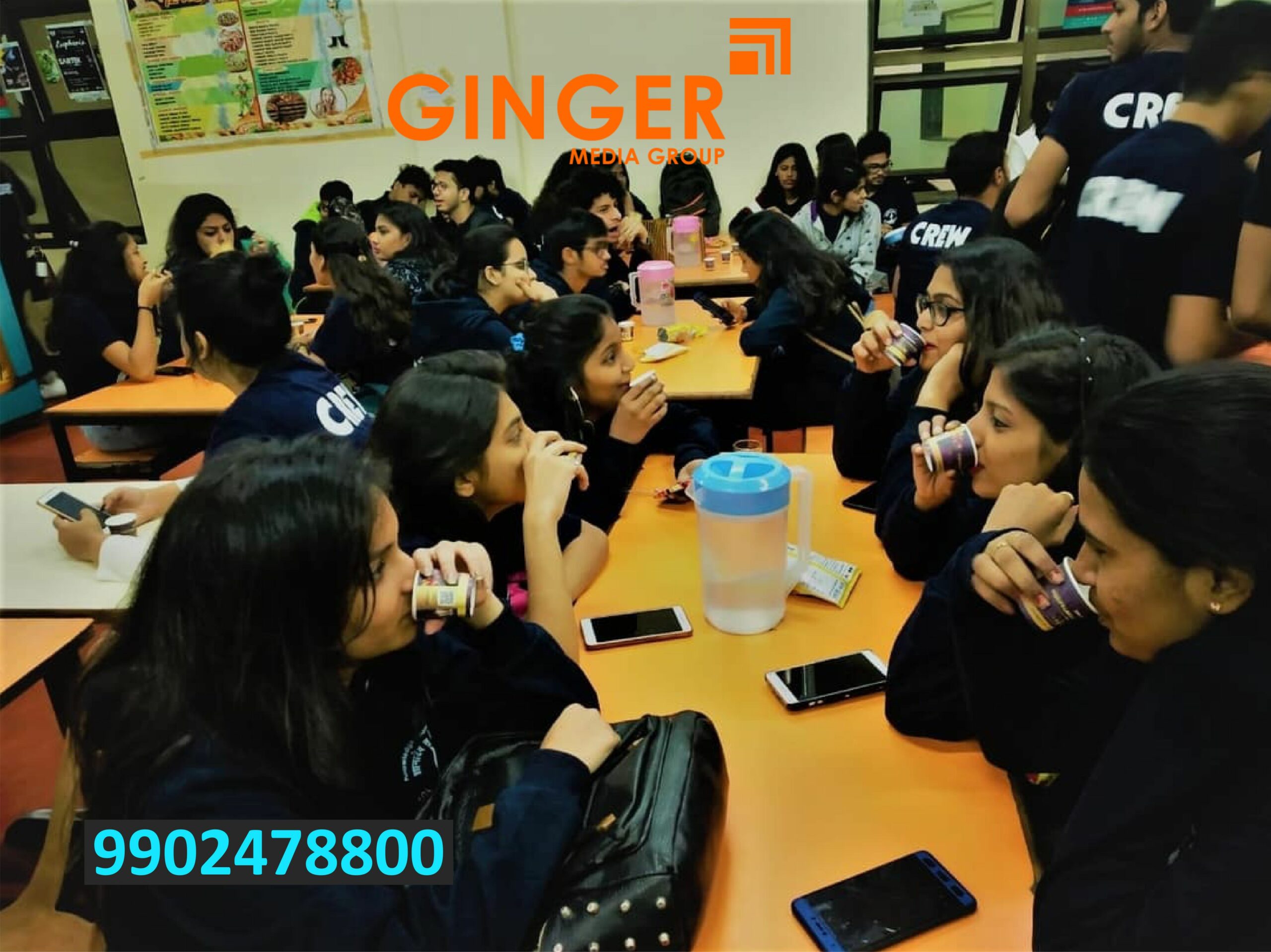 Employees using paper cup with branding