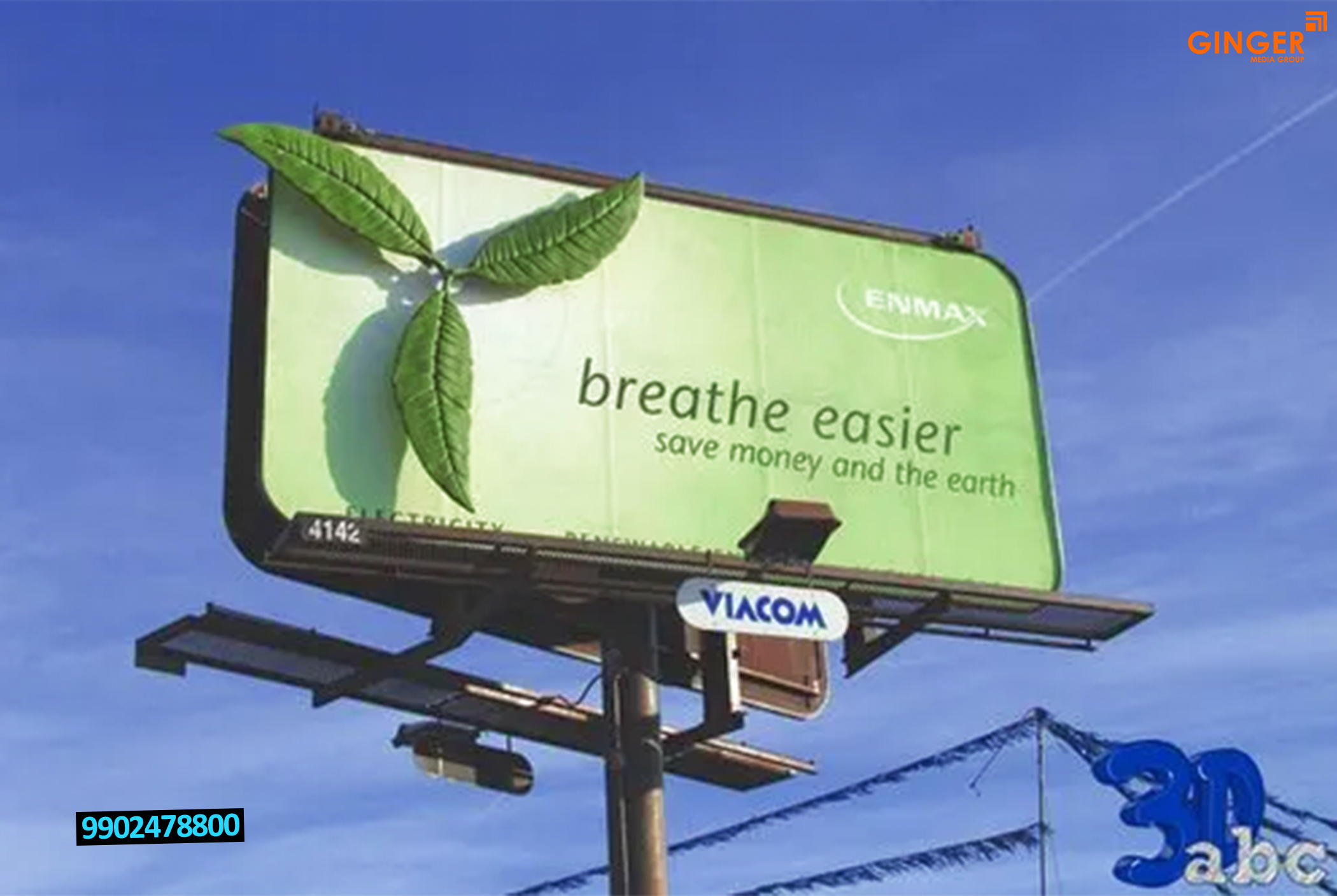 Billboard advertising in Delhi for ENMAX Brand with green color