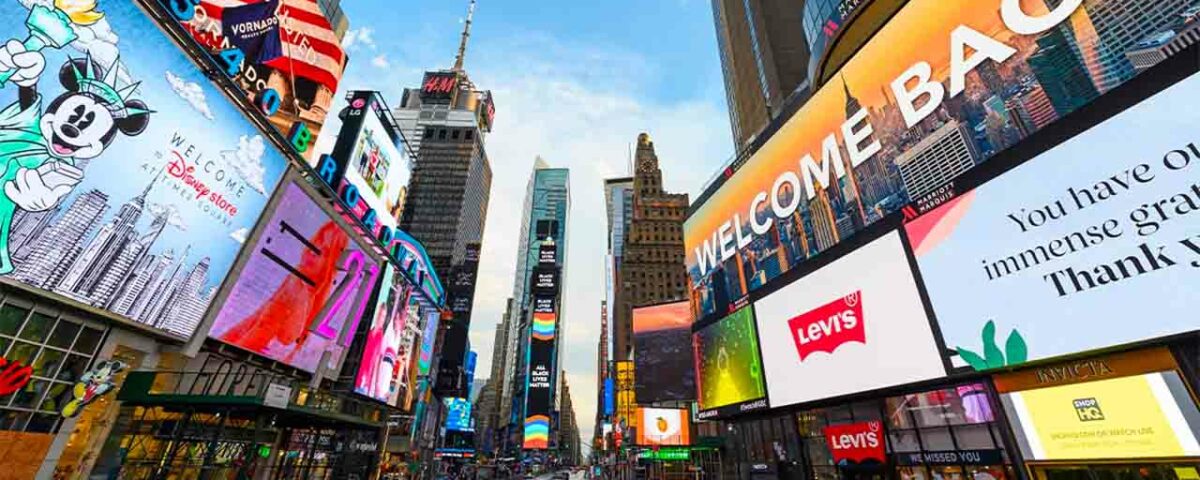 Various digital billboards on a street