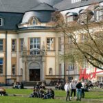 A crowd in the school ground for admissions