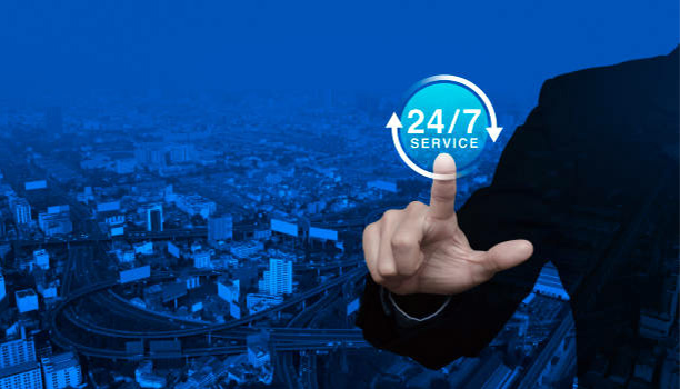 A man clicking on 24/7 service button.
