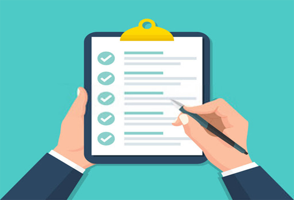 A person collection information on a sheet of paper.