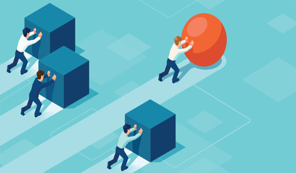 Four people participate in a race in which three people have to push a square box, while the last person has to roll a ball.