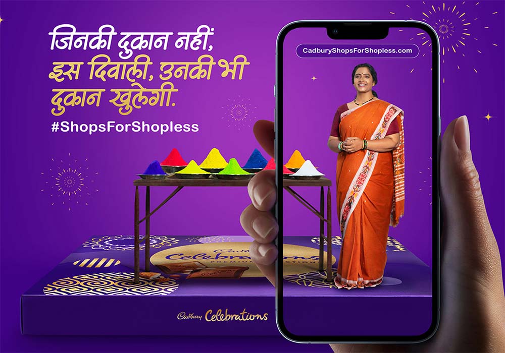 A woman selling rangoli colours on Diwali featured inside a smartphone frame.